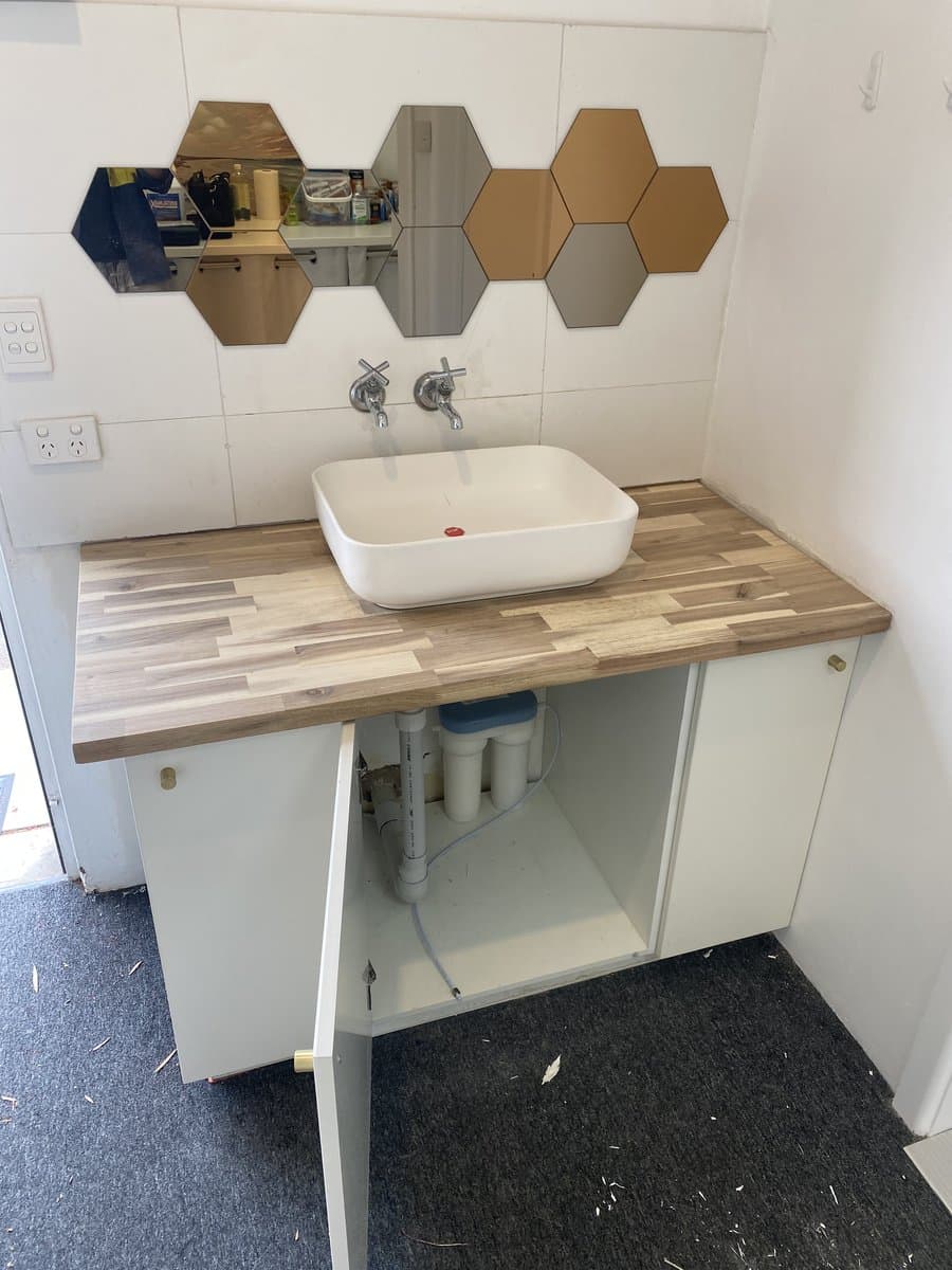 Custom timber-top bathroom vanity with vessel basin installed by ADs Maintenance Adelaide