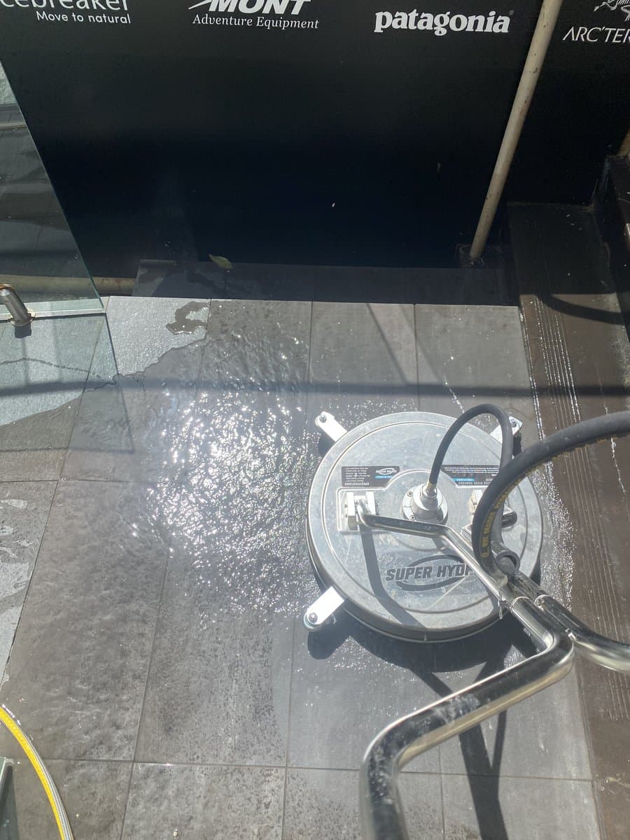 Commercial pressure washing of retail shopfront by ADs Maintenance in Adelaide