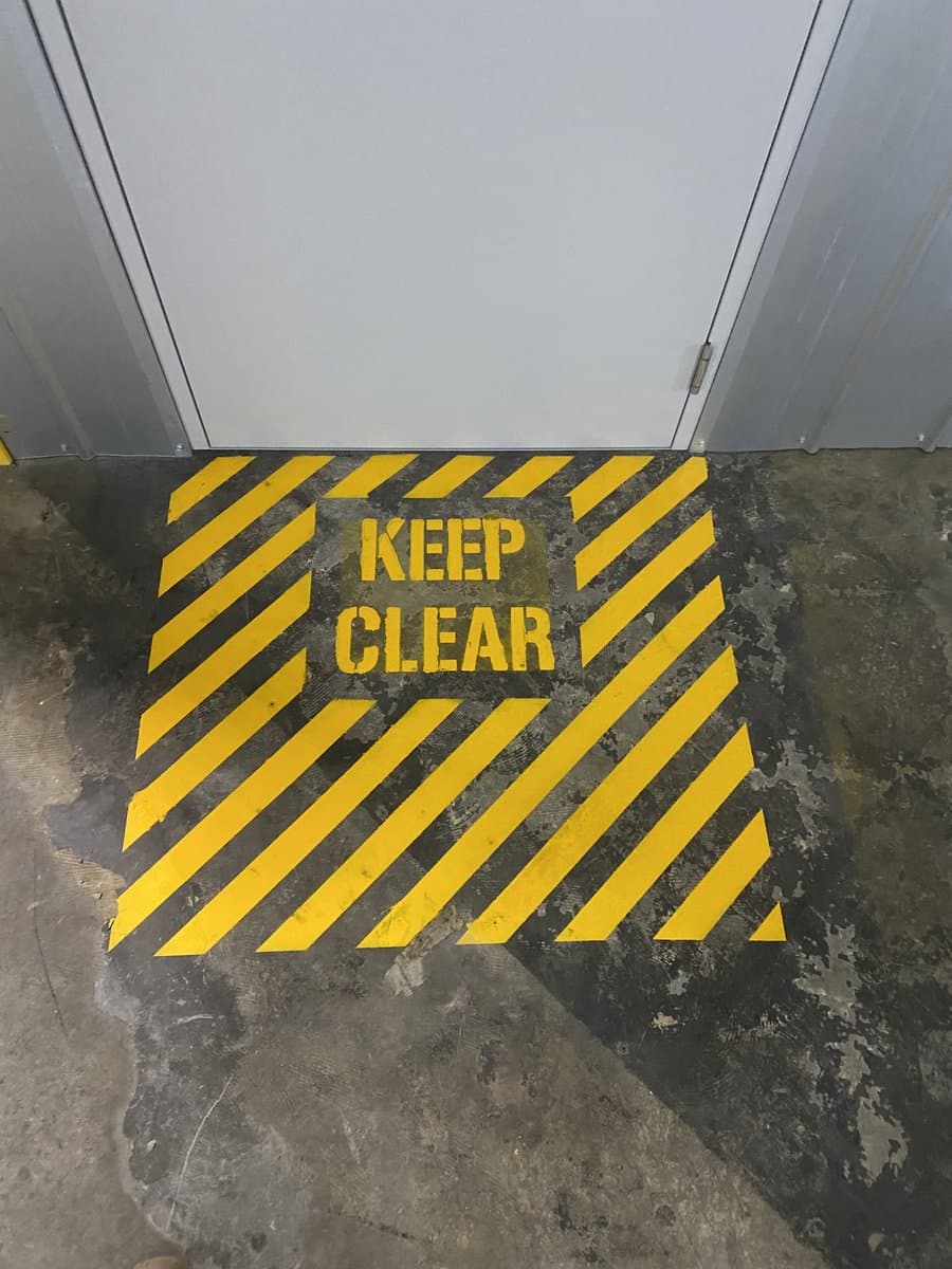 WHS-compliant safety zone line marking in commercial loading area by ADs Maintenance Adelaide - After